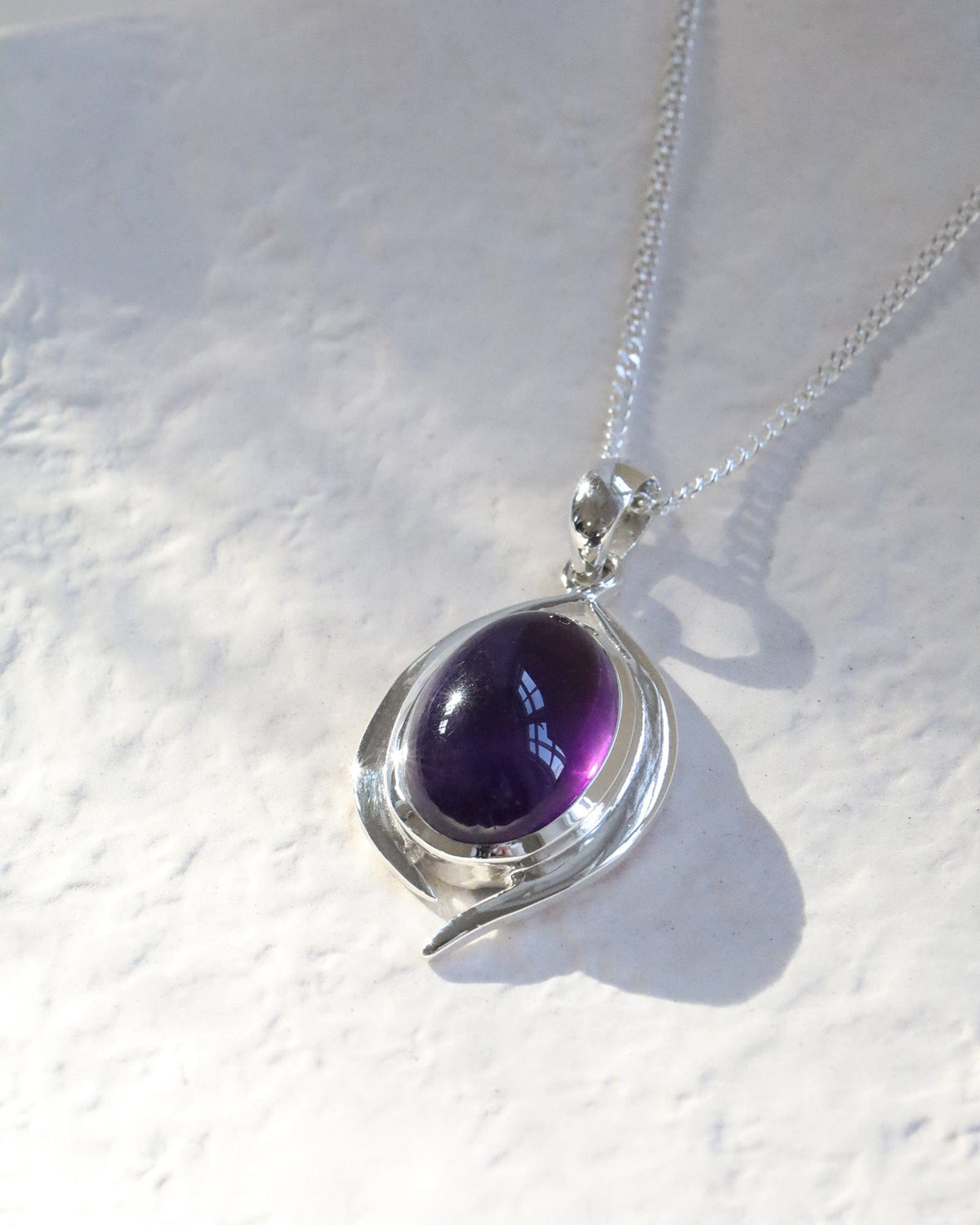 Modern Oval Sterling Silver and Polished Gemstone Pendant